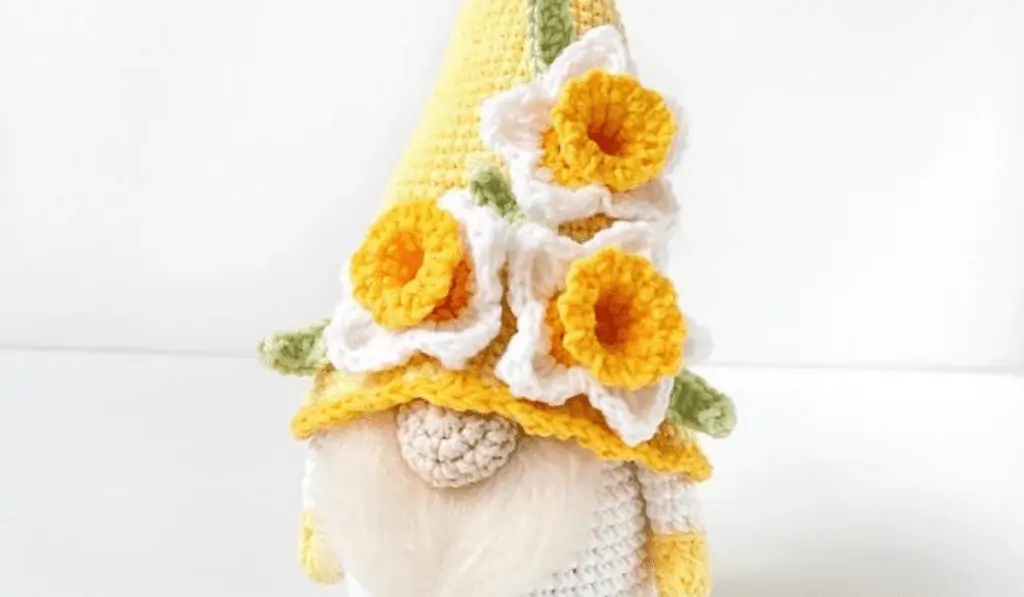 white and yellow floral gnome