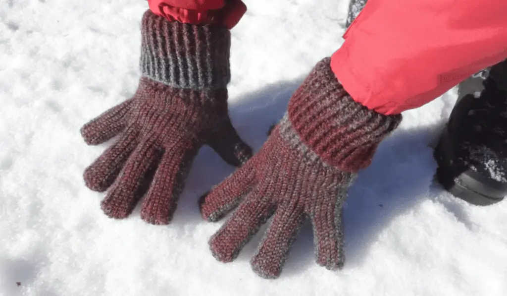Crochet gloves with the cuff folded over.