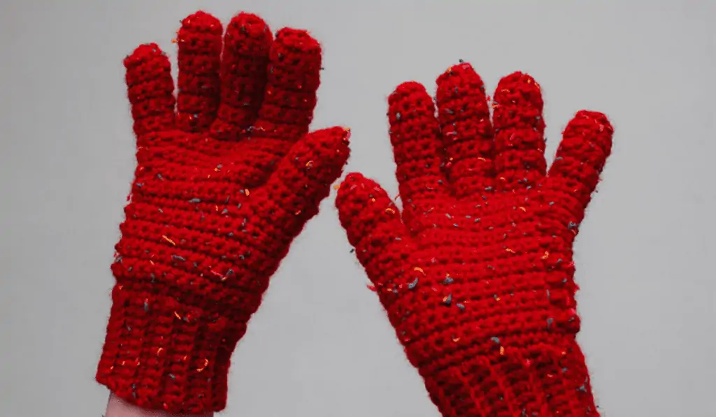 Red crochet gloves.