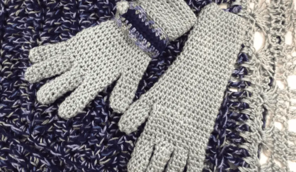 Grey crochet gloves.