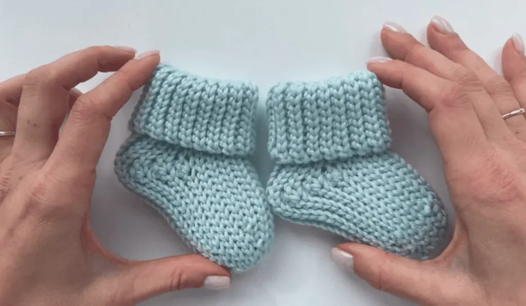 Baby crochet socks in blue.