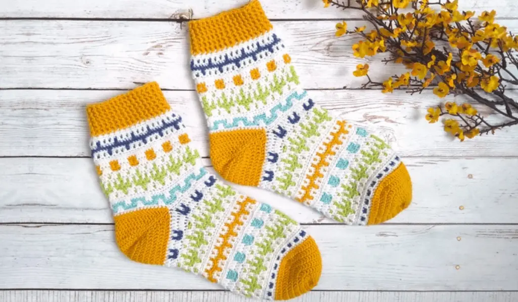 Mosaic crochet socks with little tulip stitches.
