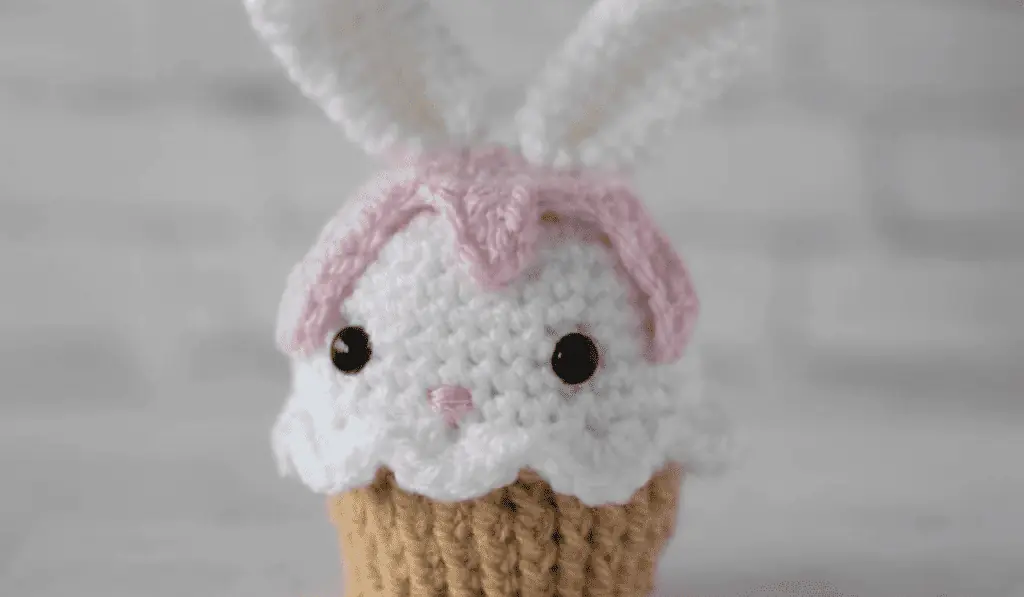 Crochet amigurumi cupcake with bunny ears