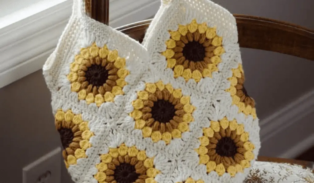 A crochet bag made out of sunflower granny squares
