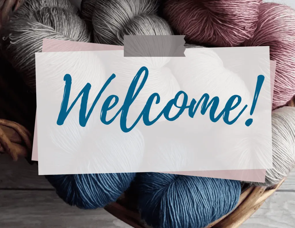 Welcome sign graphic on yarn in basket