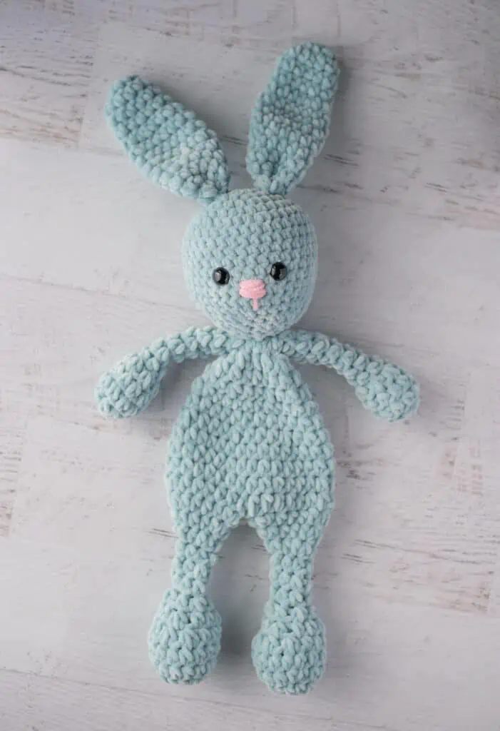 blue bunny crochet snuggler with pink nose