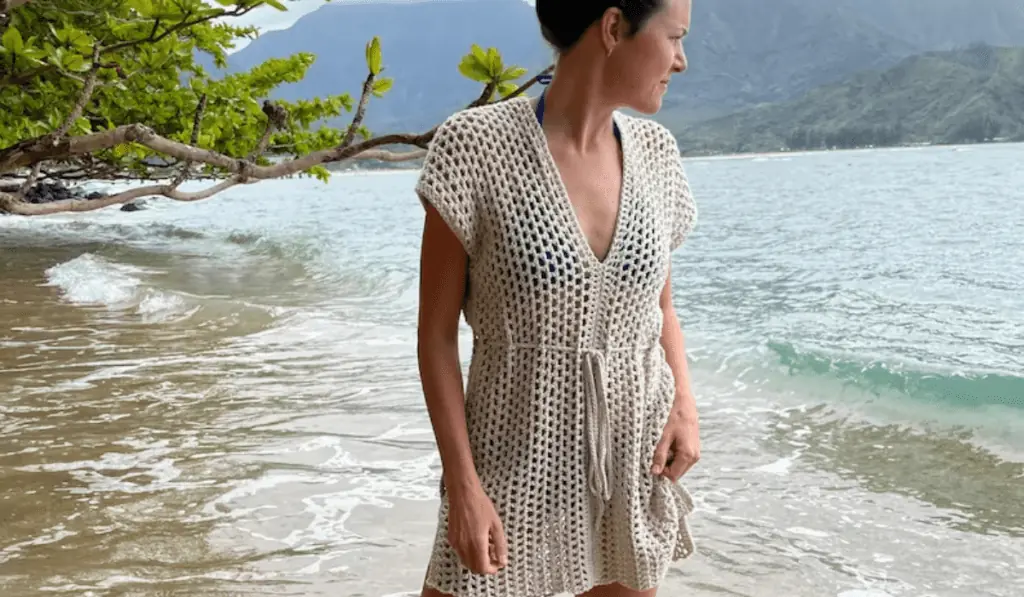 A short-sleeve crochet beach cover-up.