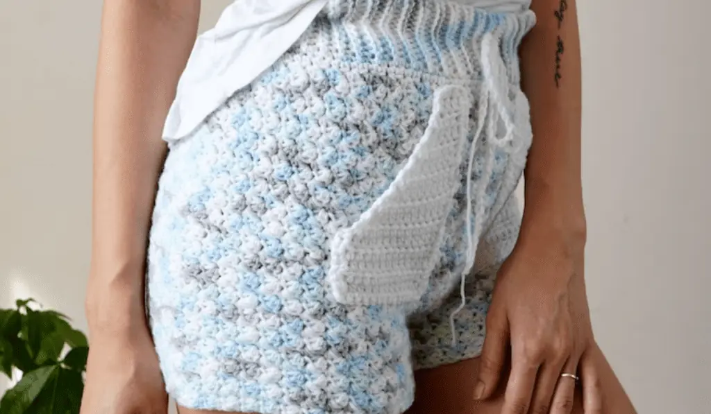 Crochet shorts with obvious pockets in the front.