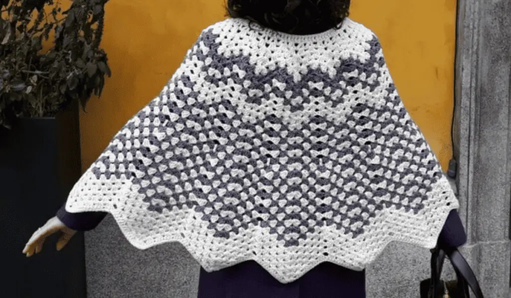 A ripple crochet poncho pattern with a zig-zag bottom