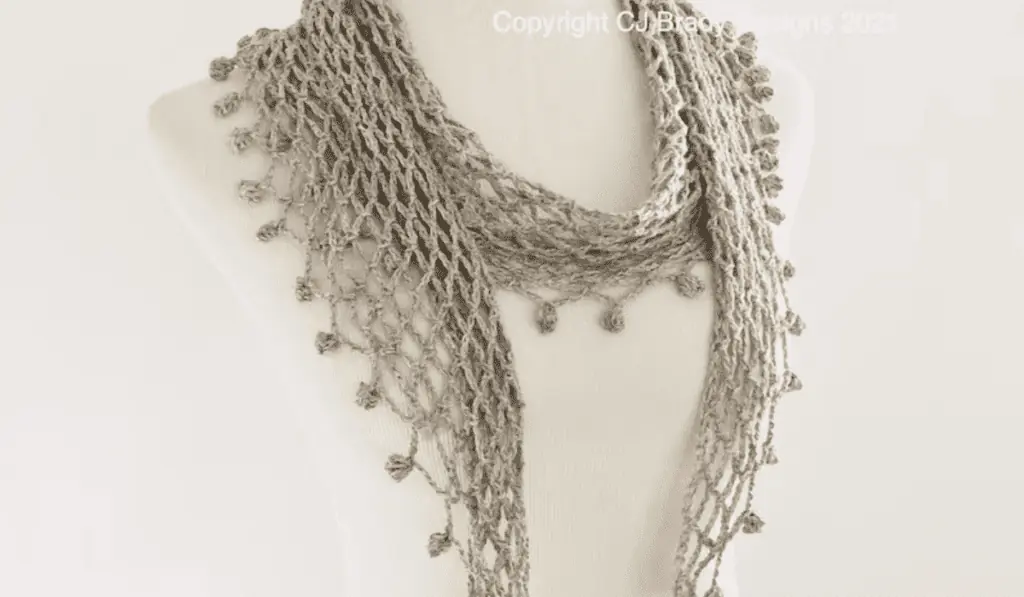 A thin, airy scarf with a lot of chain spaces.