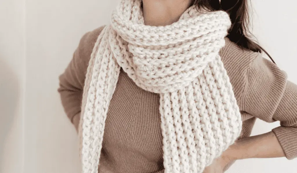 A chunk scarf made out of white yarn.