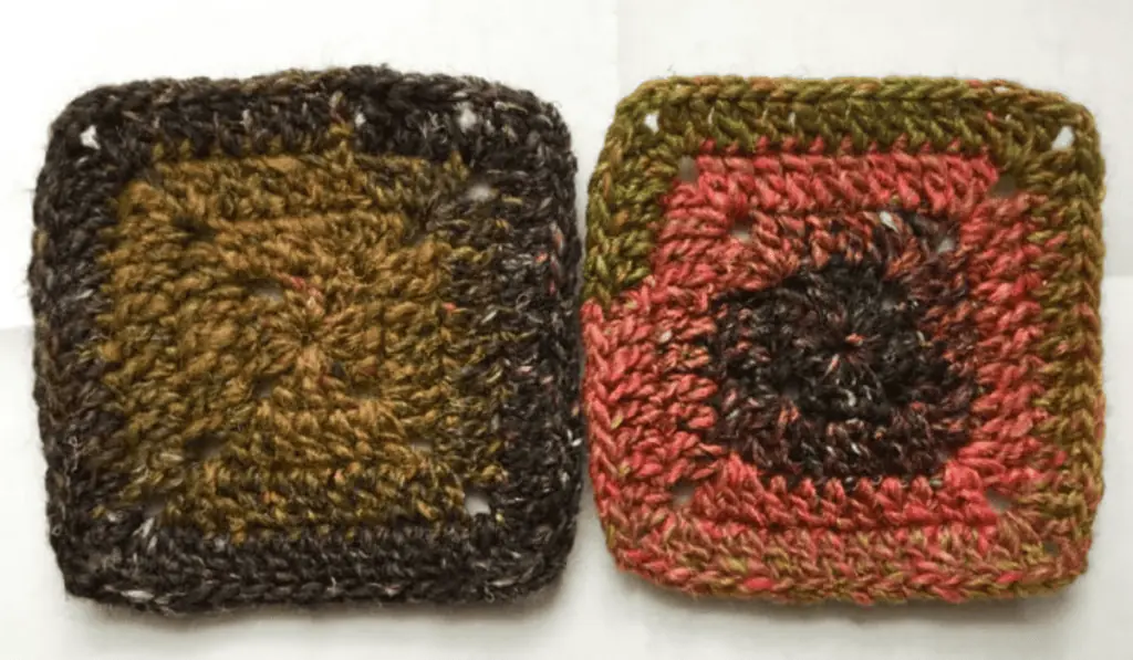 Two traditional granny squares with multicolored yarn.
