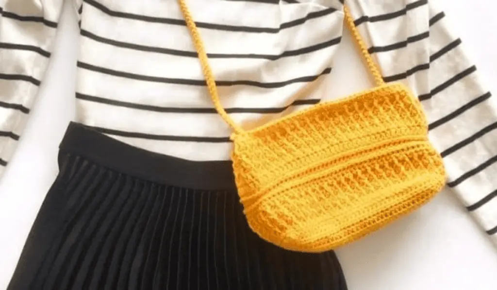 A yellow crochet bag crossbody pattern.