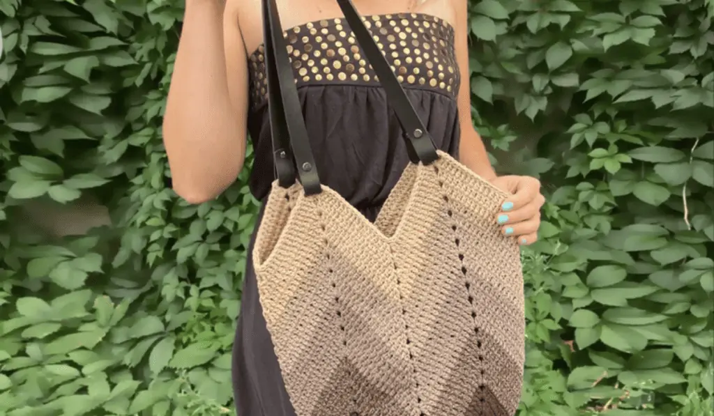 A brown ombre zig-zag crochet tote bag.