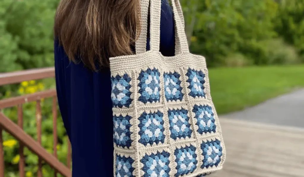 A large crochet tote bag pattern made out of granny squares.