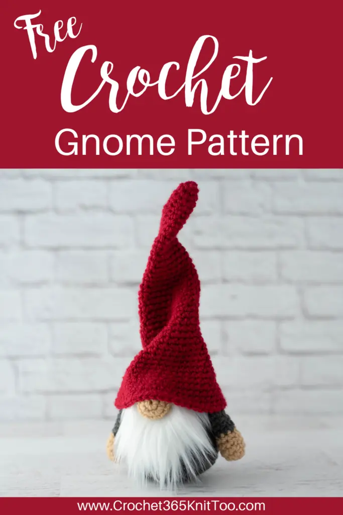 Image of gray crochet gnome with tall, red hat and furry white beard