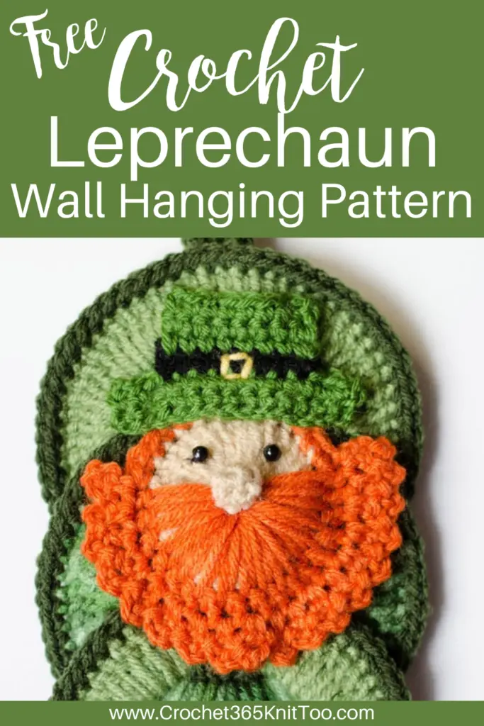 Image of crochet leprechaun wall hanging in greens and orange