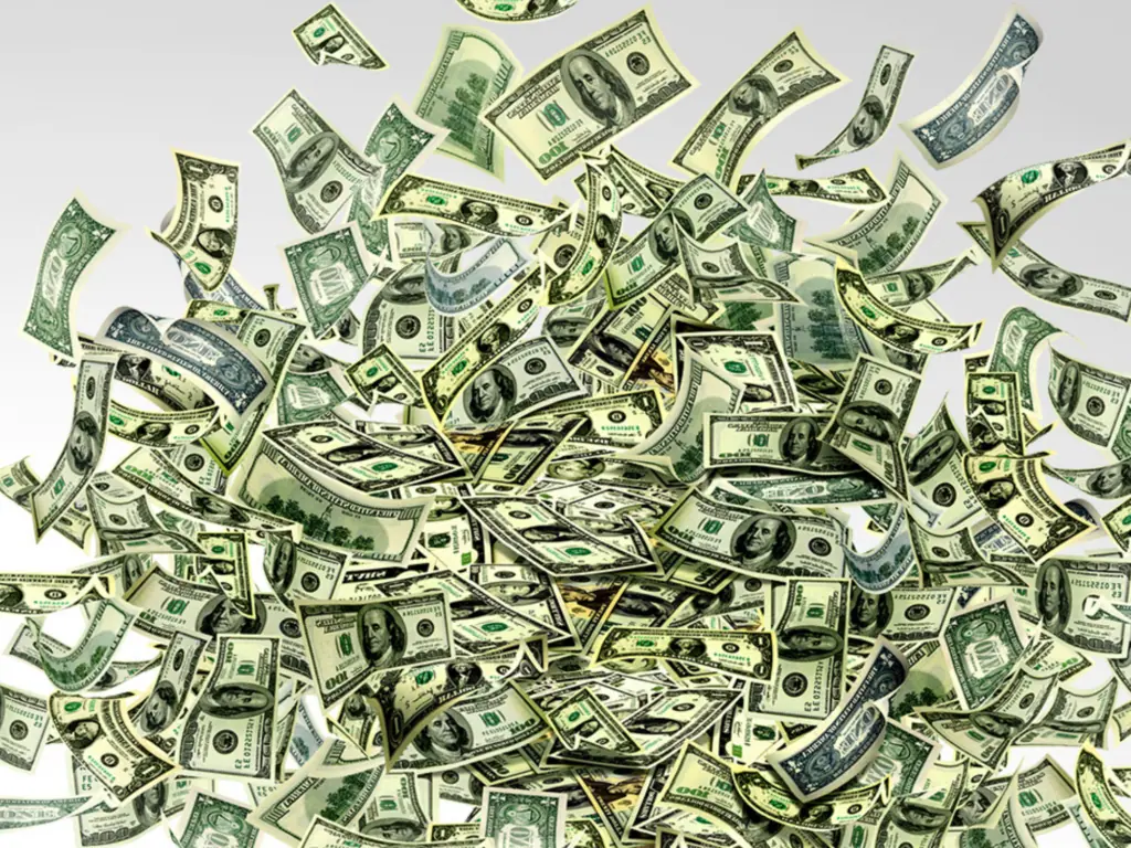 Graphic of a bunch of US bills tossed in the air
