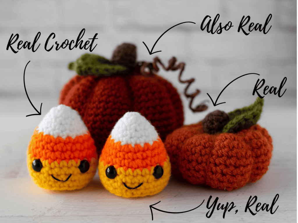 Image of real crochet pumpkins and candy corns made out of orange, green and brown yarn for pumpkins and white, orange and yellow yarn for candy corns
