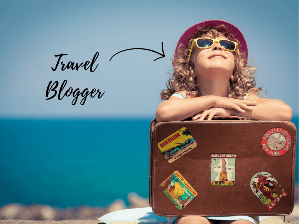 Girl with suitcase sitting by water, lookup up at the sun with the words "travel blogger" on image.