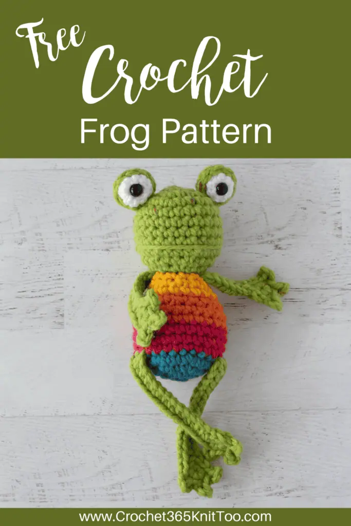 Crochet green frog with yellow, orange, red and blue striped body