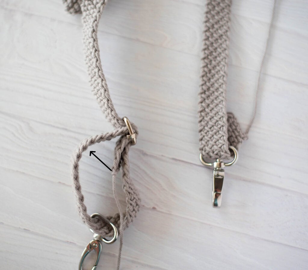 Gray crochet strap with metal hardware