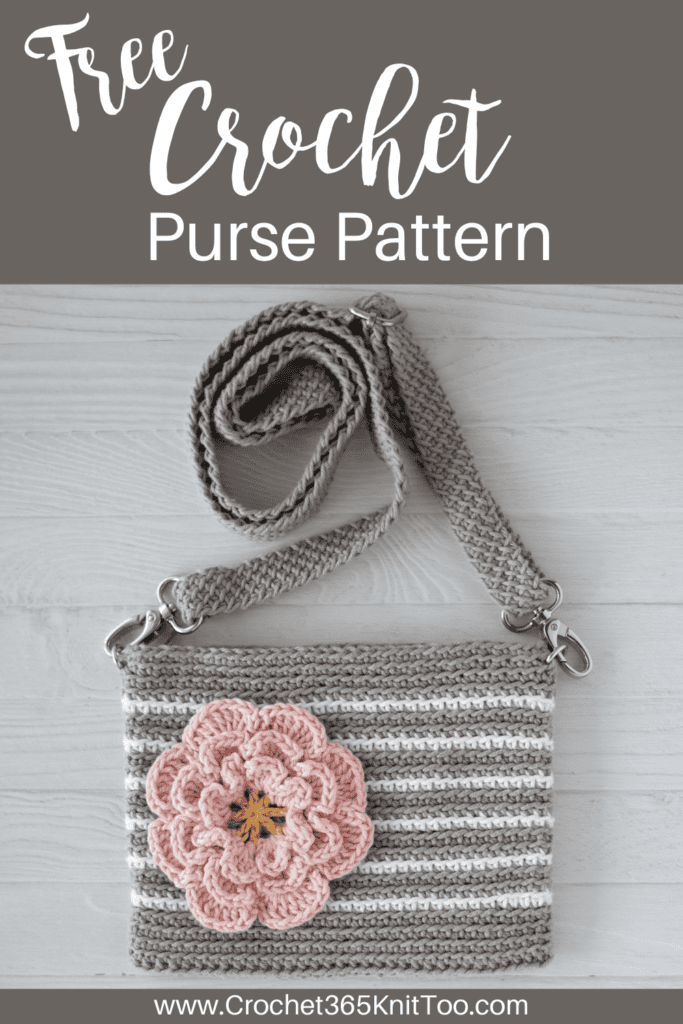 Pin image of a gray and white striped crochet bag with a pink flower