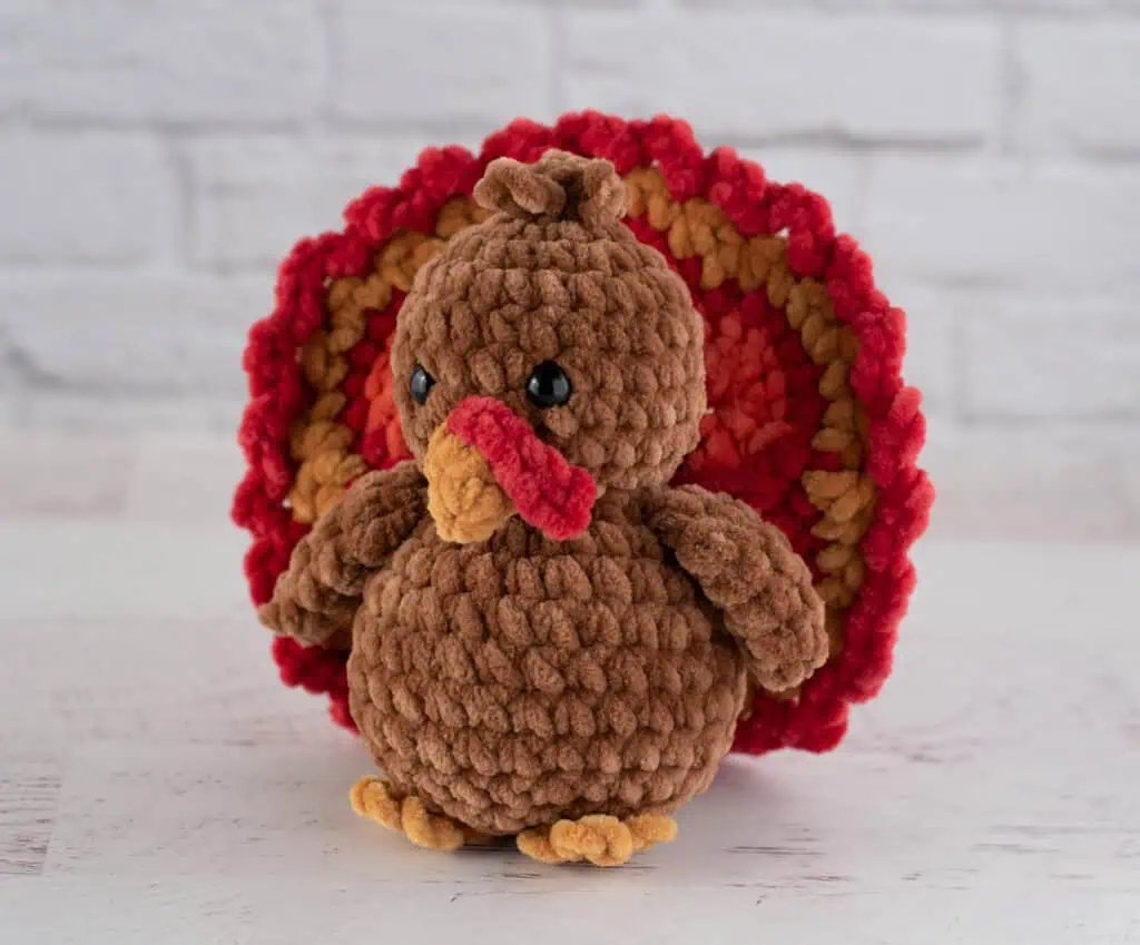 Crochet brown turkey with red, gold and orange accents