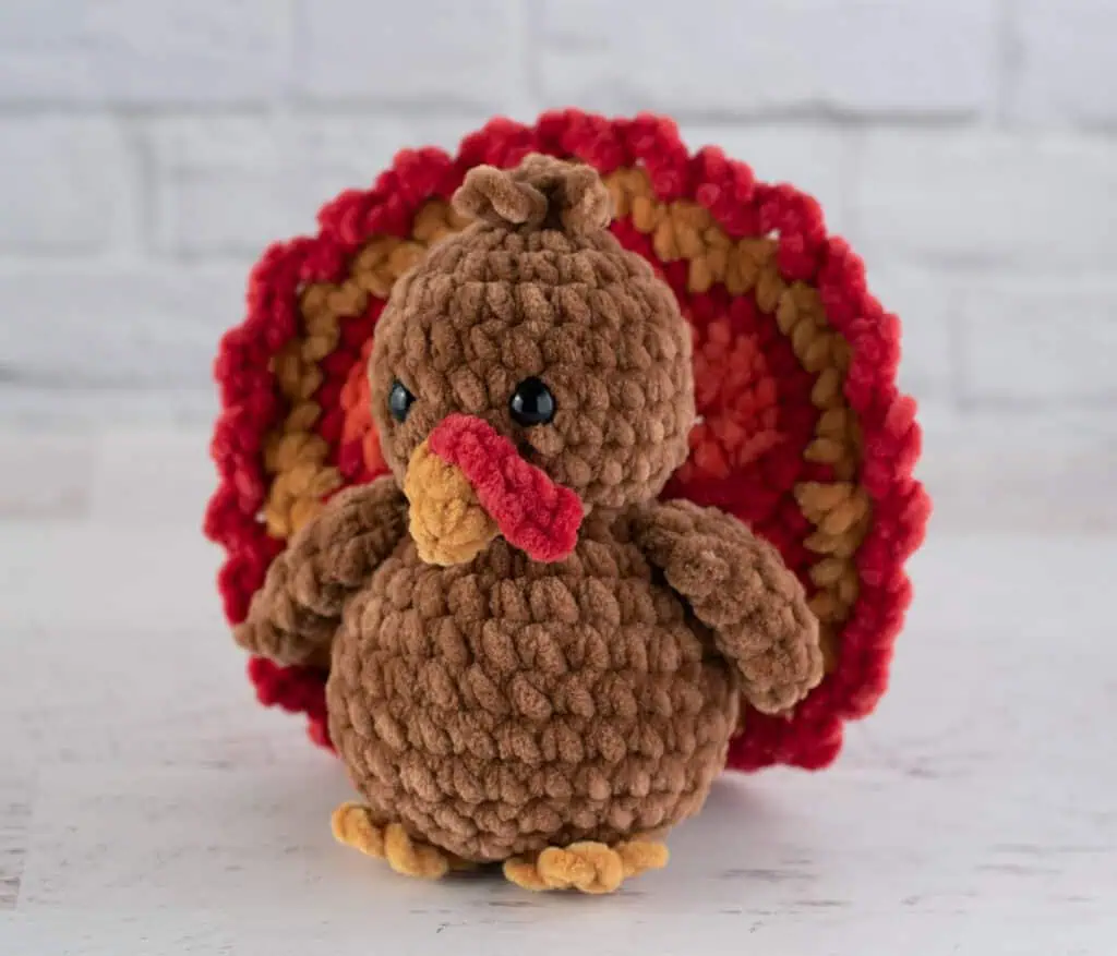 Crochet brown turkey with red, gold and orange accents
