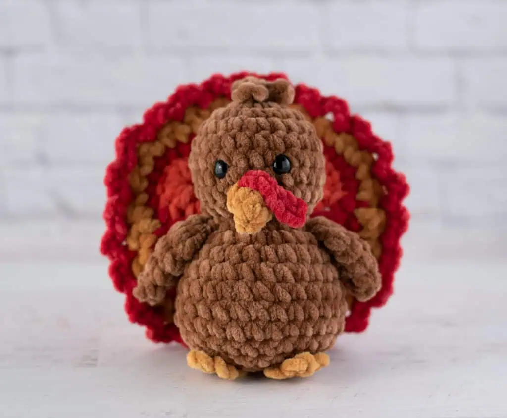 Crochet brown turkey with red, gold and orange accents