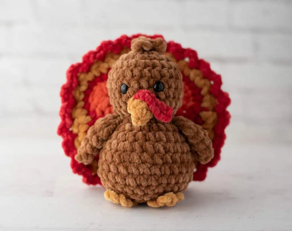 Crochet brown turkey with red, gold and orange accents