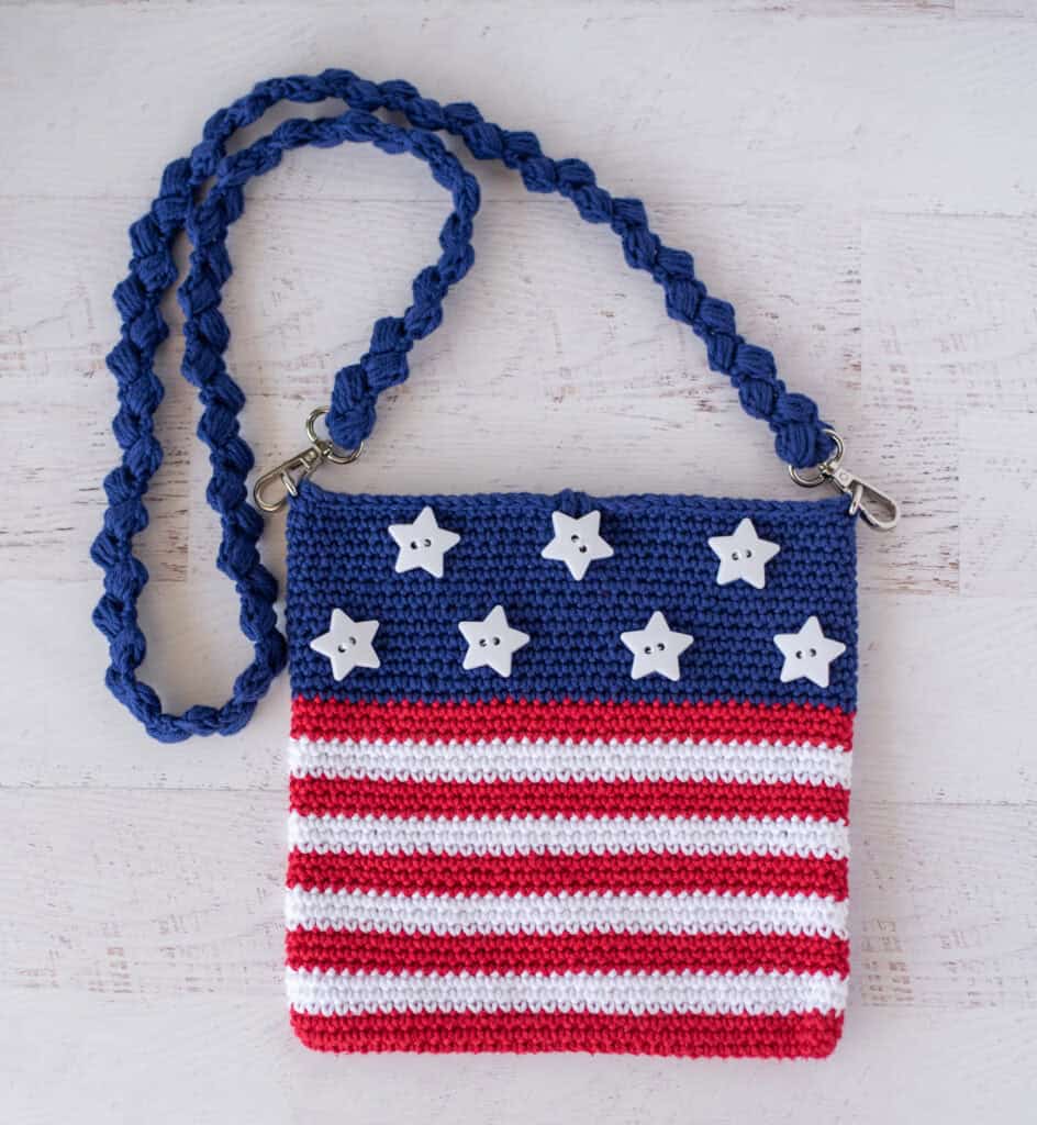 crochet red, white and blue bag with white star buttons