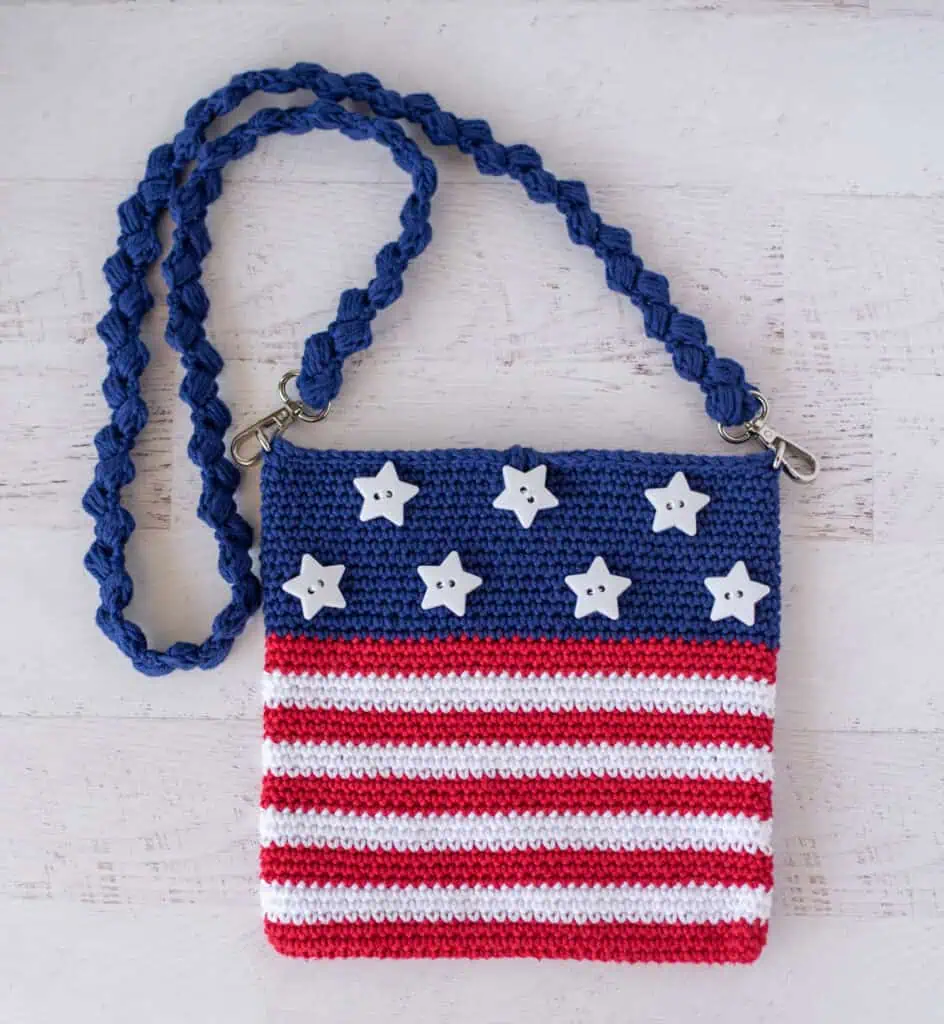 crochet red, white and blue bag with white star buttons