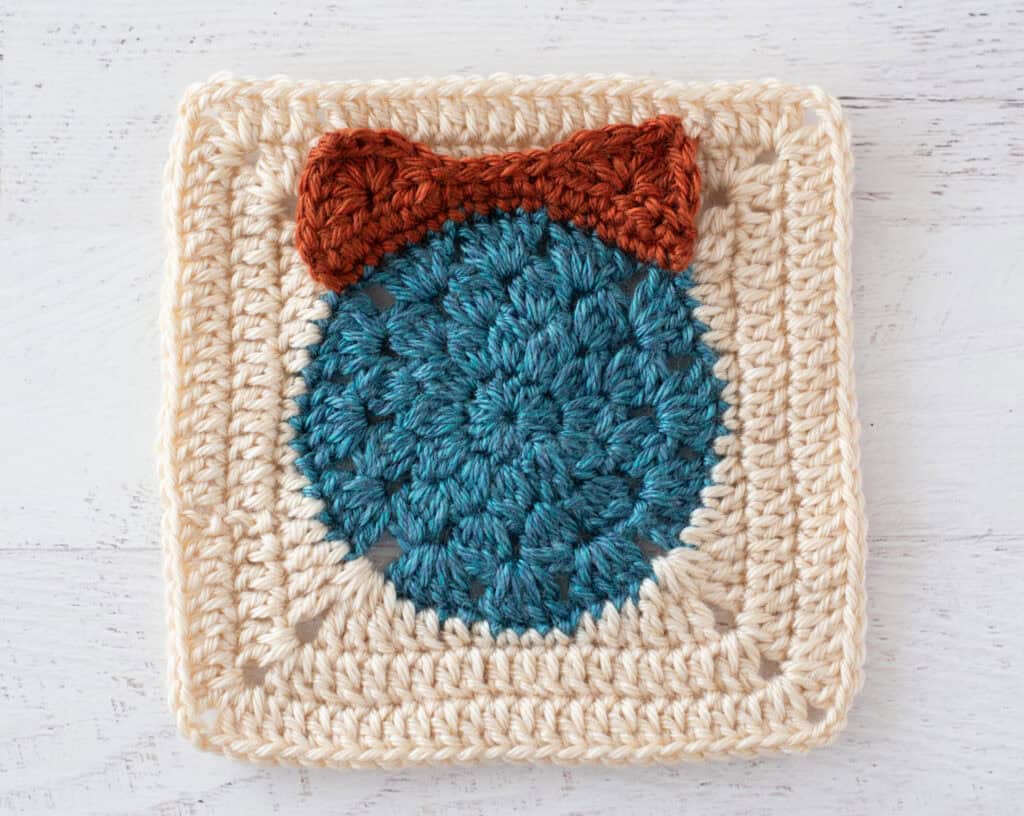 blue, orange and cream crochet granny square