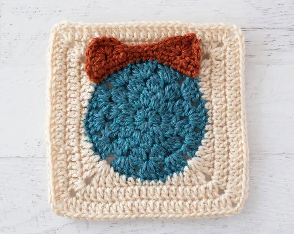 blue, orange and cream crochet granny square