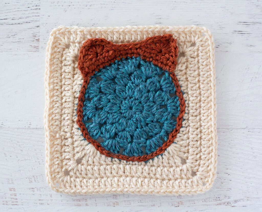 blue, orange and cream crochet granny square
