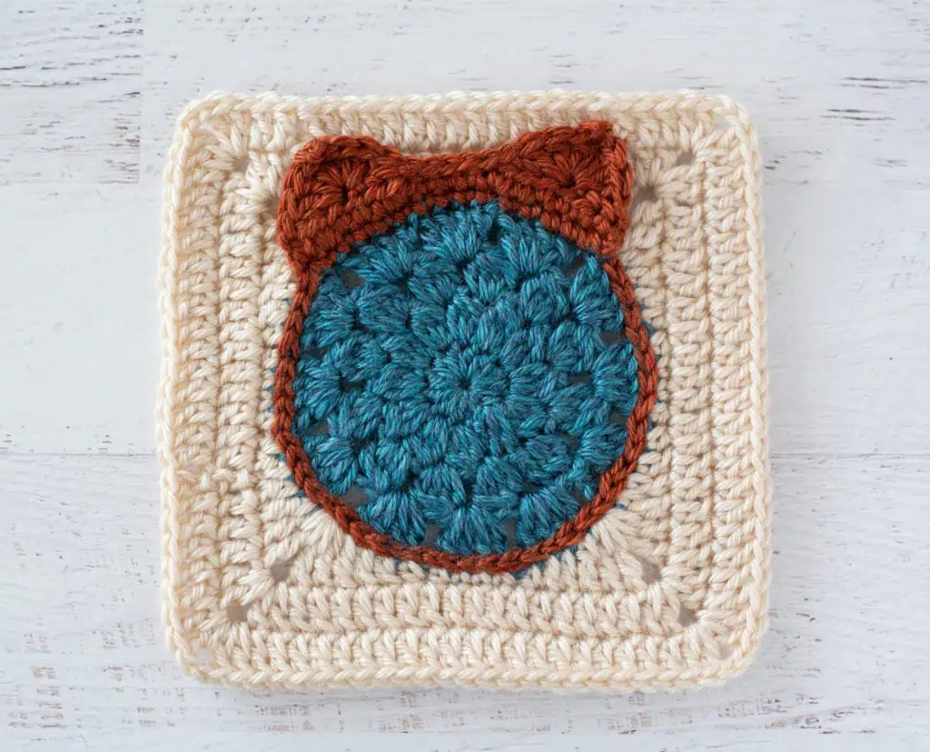 blue, orange and cream crochet granny square