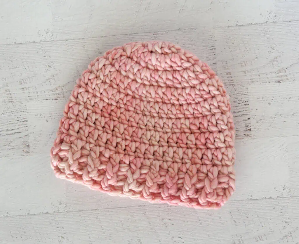crochet hat in pink yarn