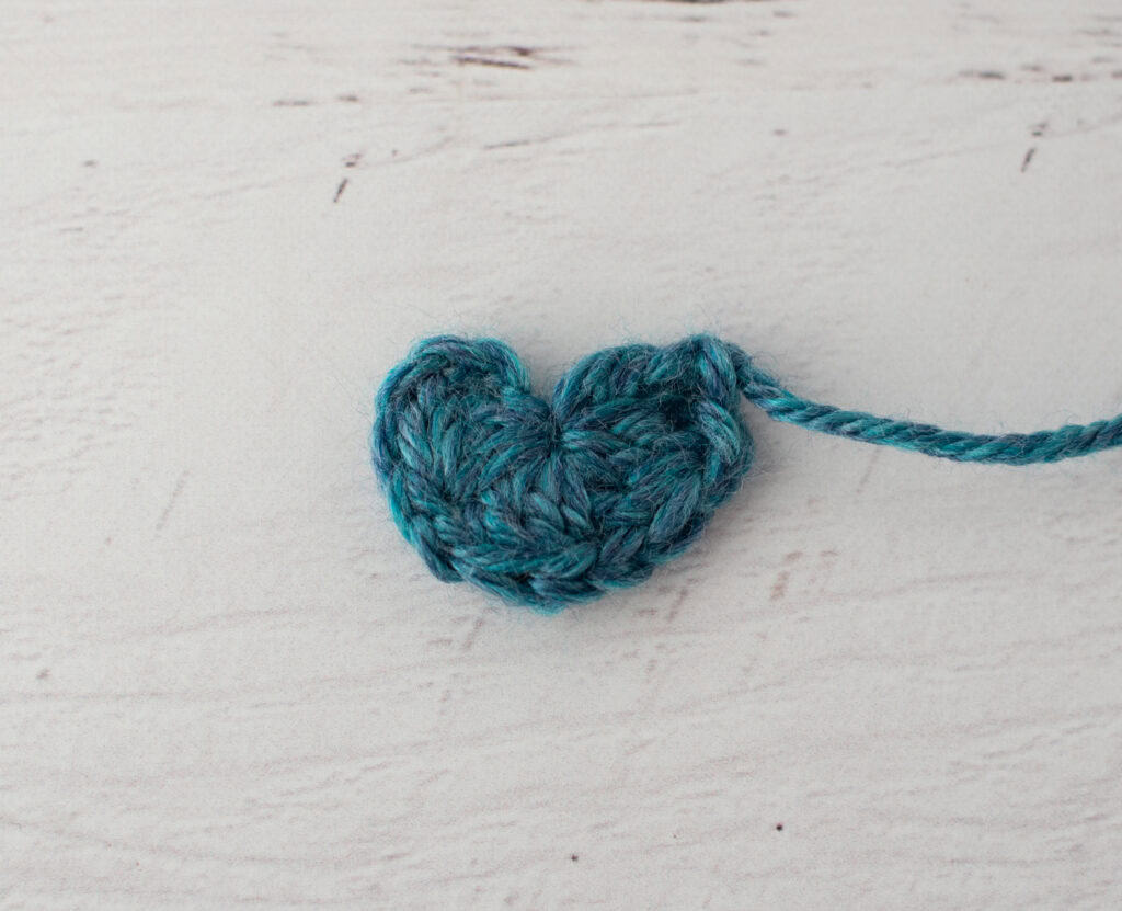 crochet motif in blue yarn