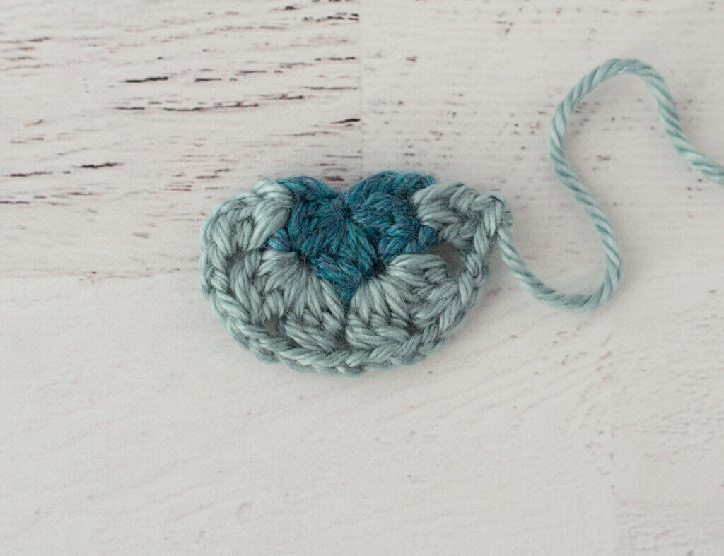 crochet motif in blue yarn