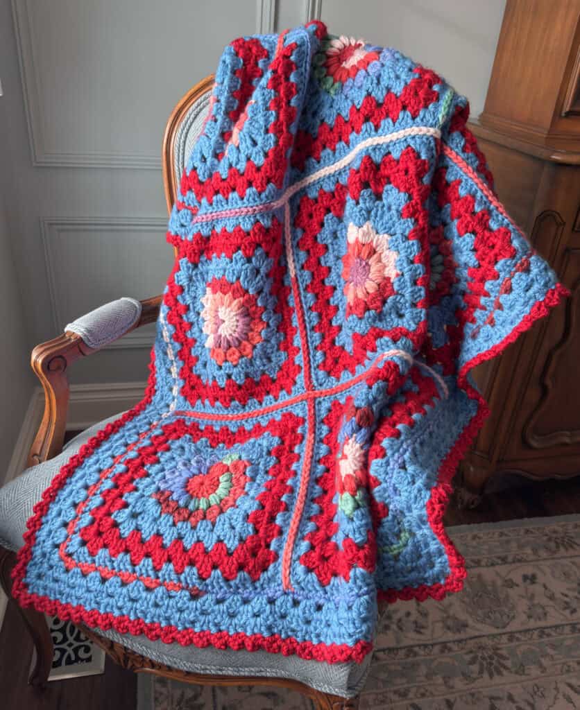 Colorful crochet afghan on a chair