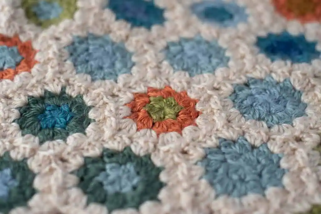 Close-up of crochet granny hexagon blanket