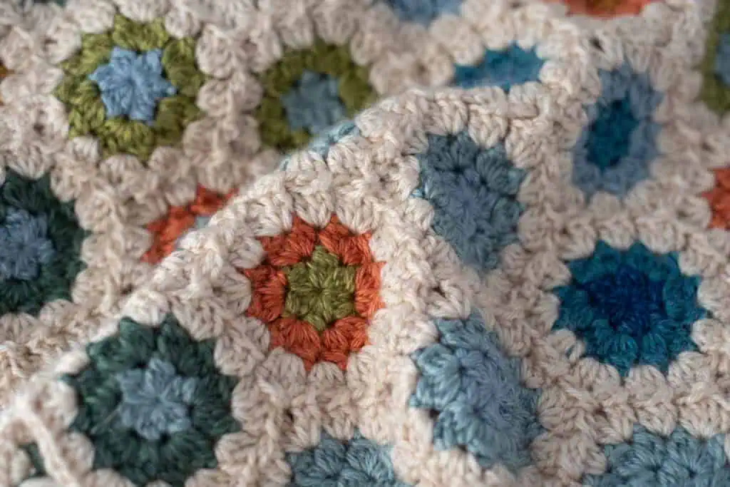 Close-up of crochet granny hexagon blanket