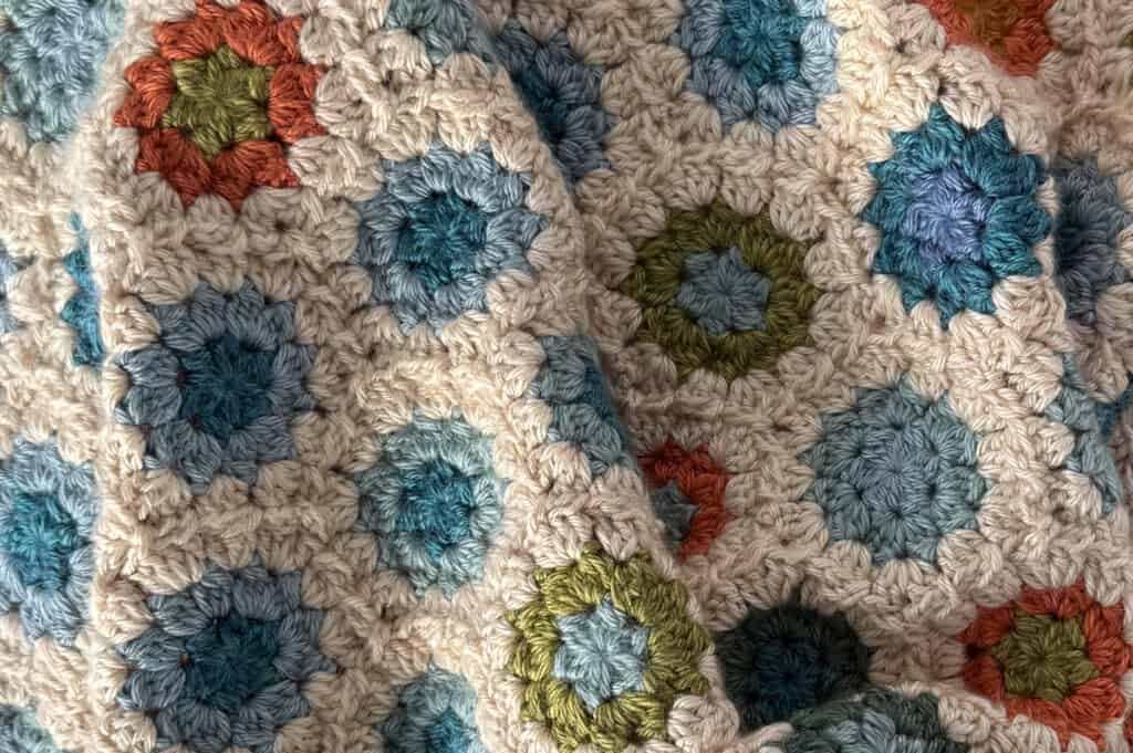Close-up of crochet granny hexagon blanket