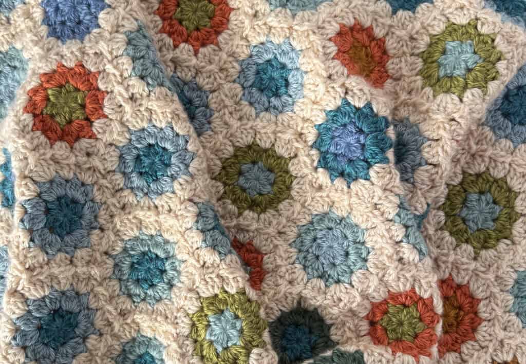 Close-up of crochet granny hexagon blanket