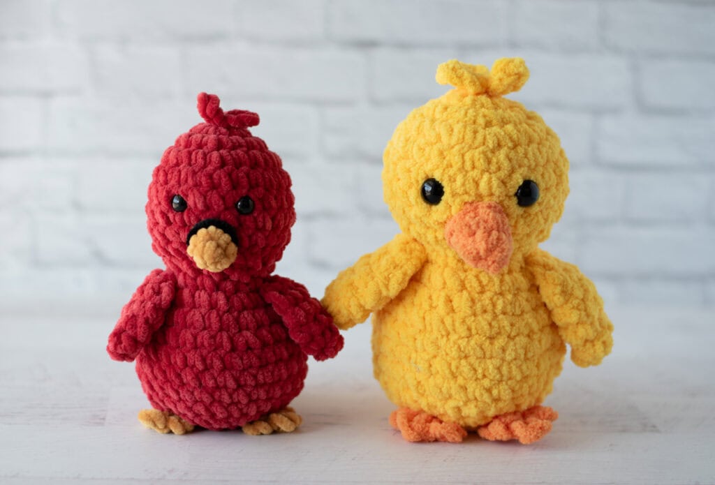 Crochet yellow chick and red cardinal amigurumi toys
