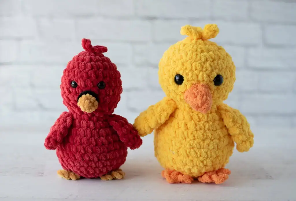 Crochet yellow chick and red cardinal amigurumi toys