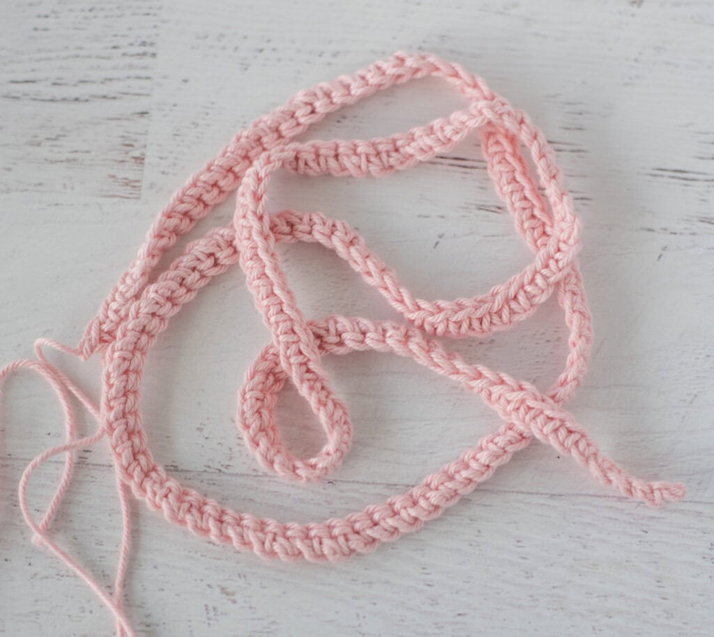 Strap for crochet market bag in pink yarn
