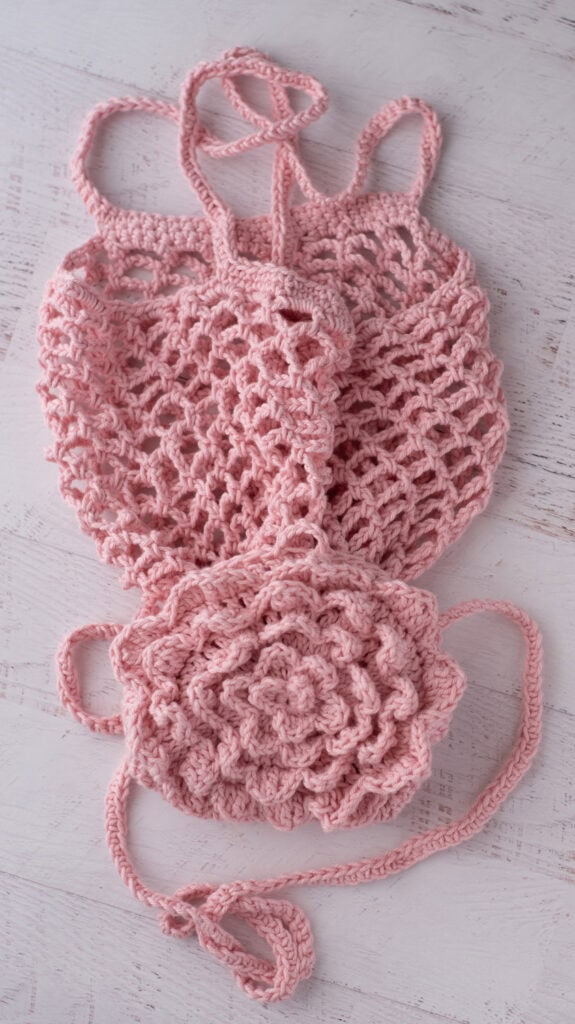 Pink crochet market bag unfolded