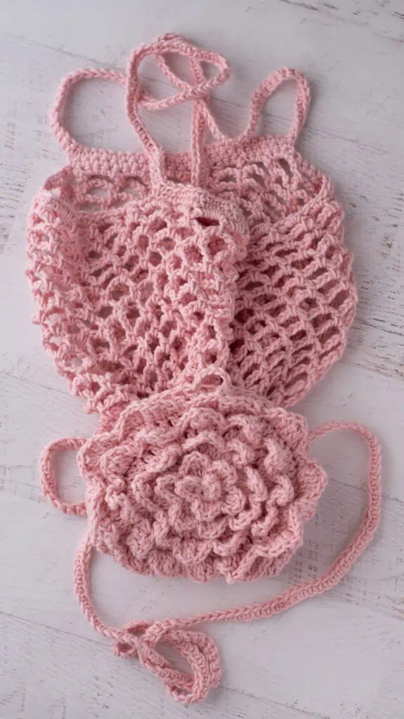 Pink crochet market bag unfolded